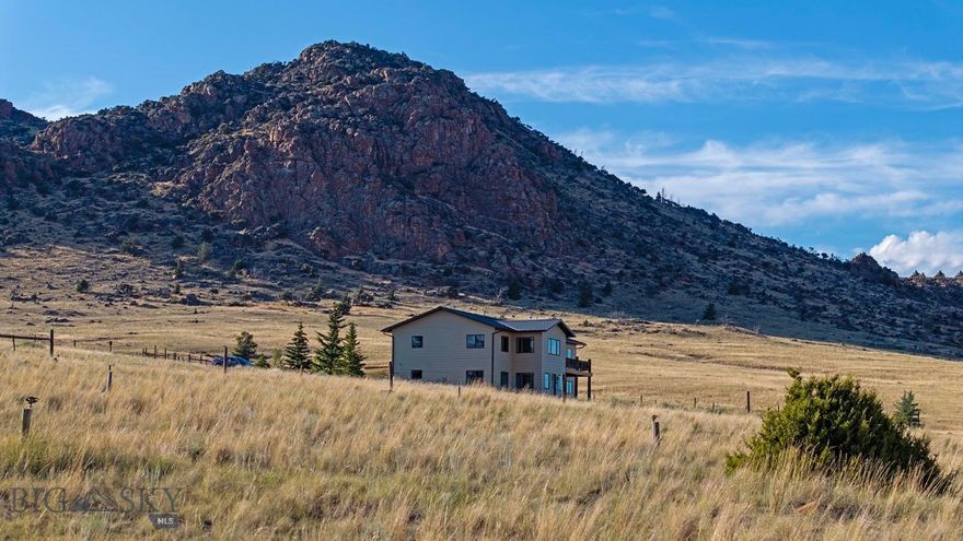 This exclusive 20± acre property provides a beautiful, tranquil mountain setting with outstanding views of wildlife and surrounding mountain ranges. Excellent hunting and fishing opportunities can be found a short drive away. Amenities are close by in the fly fishing town of Ennis, Montana. Improvements include a 2,944± square foot, three-bedroom, two-bathroom home and a 40'x64' shop with tack room and equipment storage, perfect for the equestrian.