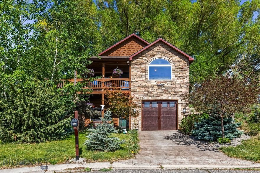 This beautifully crafted 3-bedroom, 2-bath home built in 2006, offers 1,896 sq. ft. of living space on an expansive 12,782 sq. ft. lot at the end of a cul-de-sac.  Inside, you’ll find many recent updates, including fresh interior paint throughout, new luxury vinyl kitchen flooring, new carpeting on the stairs, upgraded lighting, and new smoke detectors. Both bathrooms feature new fixtures, and the downstairs tub has been beautifully refinished. The striking chimney surround has been upgraded with Evolve Stone and topped with a custom raw copper chimney cap, adding timeless curb appeal. Additional improvements include a wood plank stamped driveway and an air conditioning system (2022).  A $3,000 carpet allowance for the downstairs gives buyers the opportunity to add their own finishing touch. The exterior siding and beams, which were milled and cut directly on the property, combined with the natural stone veneer give this home a distinctive character. Backing up to ranch land, this property offers a sense of privacy and open space with beautiful views of Livingston Peak, the Absaroka Mountain Range, and Sheep Mountain. A seasonal irrigation ditch runs along the back property line, creating a soothing backdrop of trickling water. Mature landscaping surrounds the home adding shade and privacy, while the attached garage adds everyday convenience. Located just a few blocks from the new Livingston Wellness Center (scheduled to open in 2027), this property combines comfort, craftsmanship, scenery, and location in one exceptional package.