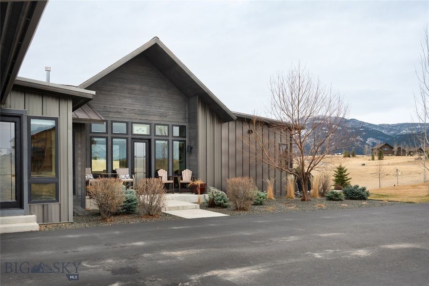 Set on 1.69± acres in Springhill Reserve, this thoughtfully designed home by Rosa Johnson captures sweeping views of the Bridger Mountains and surrounding valley while offering space, privacy, and convenient access to Bozeman. Large windows throughout the main living areas bring in abundant natural light and frame the incredible Montana landscape.

The main level features an open and inviting floor plan with a spacious living room highlighted by soaring ceilings and a gas fireplace, flowing easily into the dining area and well-appointed kitchen with a large island—ideal for everyday living and entertaining. The primary suite is located on the main floor and enjoys beautiful mountain views, along with a spacious bathroom featuring a soaking tub, walk-in shower, and generous closet space. A guest bedroom with its own ensuite bathroom and walk-in closet. A dedicated main level office with private access provides flexibility for visitors or working from home.
The laundry room is complete with a dog wash station and access to the west patio to enjoy the beautiful sunsets. 

The finished lower level includes additional living space with two bedrooms, a full bathroom, and a large family room—perfect for guests, recreation, or a second living area.  The walk-out lower level offers access to the swim spa and lower patio. 

Outdoor living is equally appealing with a covered patio and landscaped yard designed to take full advantage of the surrounding scenery. Located just minutes from Bozeman while offering the tranquility of larger acreage homesites, Springhill Reserve provides a peaceful setting with about 5 miles of trail systems and easy access to shopping, dining, and outdoor recreation.