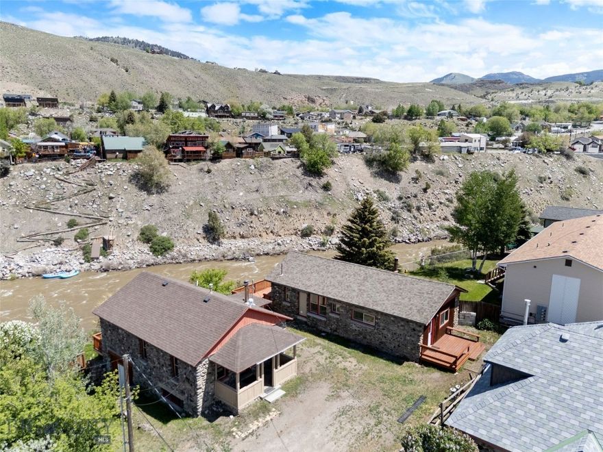 Welcome to 504 4th Street—an updated 2-bedroom, 1-bathroom home in the heart of Gardiner, Montana. Just minutes from the North Entrance of Yellowstone National Park, this charming rock home has been thoughtfully remodeled in 2025 with new windows, flooring, trim, electrical, plumbing, and a modernized kitchen and bathroom. Step out onto the spacious back deck and take in stunning views of the Yellowstone River. The lower level features a separate entrance—perfect for extra storage or future expansion into a guest suite or income-producing unit. With shops, dining, school and park access all within walking distance, this property is an ideal home base, getaway, or investment opportunity in one of Montana’s most sought-after locations.