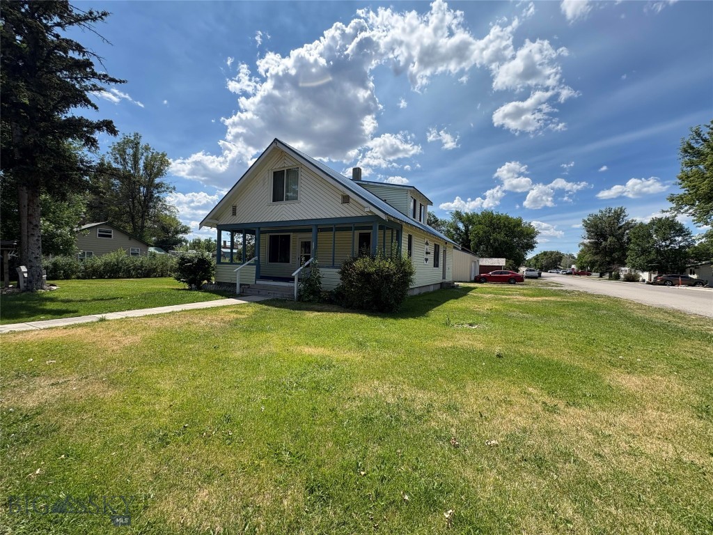 Built in 1917, this craftsman style home is waiting for you and your imagination.  Open living room and dining area with a gas stove to keep things nice and cozy, built in drawers and cupboards for tons of great storage along with large windows. Fantastic front porch waiting for you to enjoy your morning coffee and watch the day go by.  The upper level of the home can be used as a separate apartment with private entrance for rental income or keep it all to yourself.  The upper level has small kitchen, bathroom, living room along with one large bedroom.  Full unfinished basement for extra storage space or finish it off with couple of additional bedrooms.  
This great home is located on a .25 acre lot with well for watering in the summer.  Huge 3+ car garage with 1280 sf.  Dog run, pavillion area and many mature trees.  
Home needs some tlc and updating, but don't miss out on the opportunity to make this home your own.