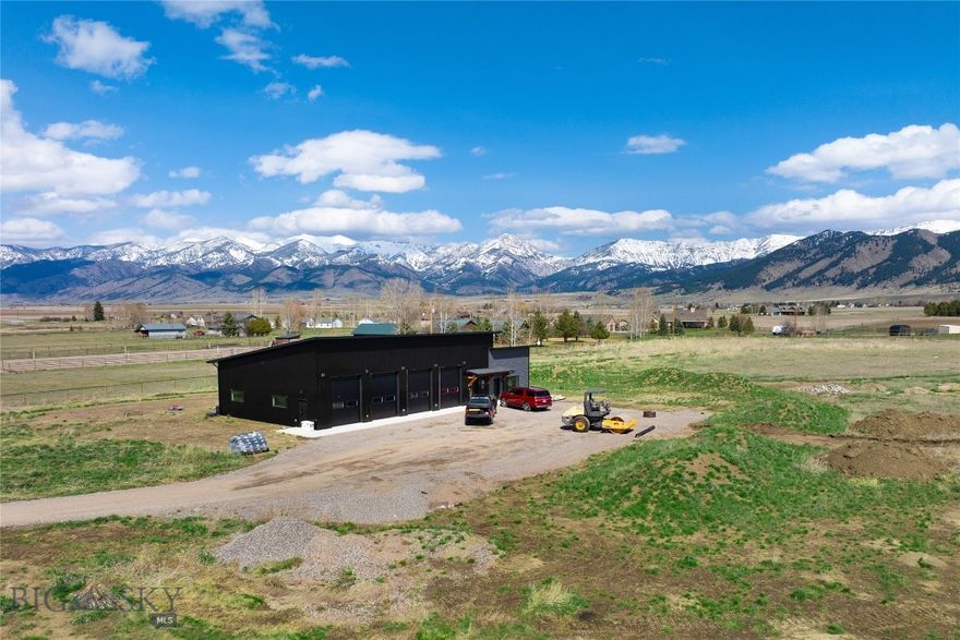 Incredible Opportunity to Build Your Dream Home on Over 6 Acres in Sought-After Springhill!
This expansive property offers the ideal setting for creating your perfect rural retreat. According to the covenants, you’re permitted to build a primary residence plus up to three additional outbuildings—perfect for a guest house, workshop, barn, or storage. Enjoy the freedom of country living with livestock allowed, giving you the space and flexibility to craft the lifestyle you’ve always envisioned.

Calling All Car Enthusiasts, Collectors & Hobbyists! Discover the perfect blend of function and comfort in this unique Springhill property just minutes from Bozeman. Situated on a spacious 6+ acre lot with breathtaking Bridger mountain views, this 2,200 sq ft shop offers endless possibilities—ideal for automotive projects, storage, woodworking, or creative endeavors. Inside, you'll find a 938 sq ft living space that combines convenience and charm, featuring an office or bedroom, a full bathroom, and a well-appointed kitchenette—making it perfect for overnight stays, weekend getaways, or guest accommodations. Whether you're looking to expand your workspace, store your toys, or relax in a quiet mountain-view setting, this property delivers the best of both worlds. Don't miss your chance to own a versatile retreat in one of Bozeman's most scenic locations!