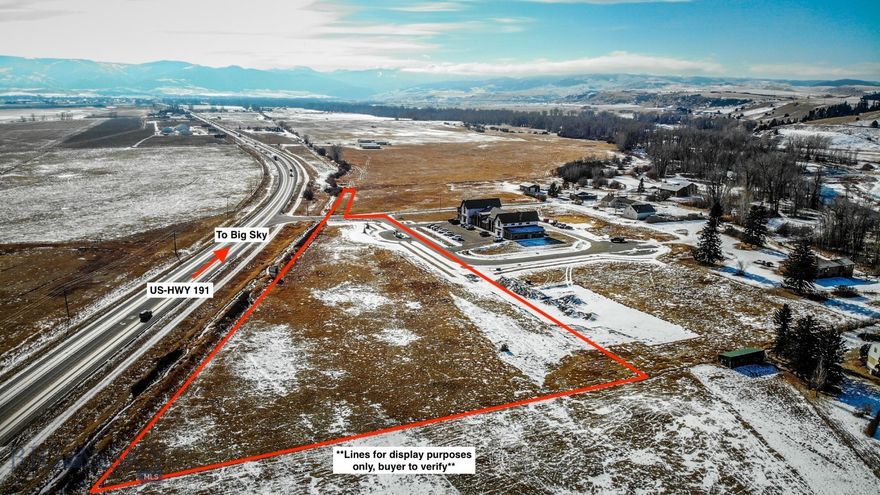 The Bridge District is Built For Business. This 4.66-acre commercial lot in the Bridge District is in a superb location, with 191 frontage and visibility. Soak up the Montana landscape with spectacular views of the Bridger Mountains and Spanish Peaks. Access an array of nearby local businesses and amenities - without the headache of being located in the city limits. Fish the Gallatin during lunch, meet clients at Cottonwood Hills Golf Course, and celebrate work success at Dry Hills Distillery, all within minutes. annual average daily traffic counts near 13,000, with easy travel between Bozeman, Belgrade, and Big Sky.  Well and public water systems included.