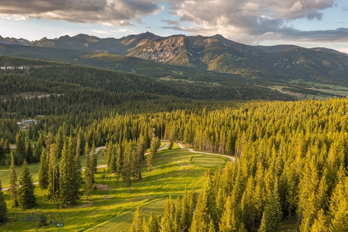 1.39-Acre Homesite with Panoramic Mountain Views in Spanish Peaks Mountain Club, Big Sky, Montana
Nestled in the heart of Big Sky’s prestigious Spanish Peaks Mountain Club, this remarkable 1.39-acre homesite offers sweeping mountain and alpine views, an ideal setting for your future mountain retreat. Positioned just minutes from the new Montage Big Sky Hotel and the Spanish Peaks Clubhouses, owners will enjoy seamless access to world-class amenities, refined dining, and premium community and resort services.
This homesite boasts proximity to the acclaimed Tom Weiskopf Signature Golf Course—a masterpiece celebrated among the best in Montana golf—as well as the exclusive Tom’s Ten, a Par 3 course designed for year-round enjoyment. In the winter months, groomed cross-country ski and snowshoe trails wind through the community, while summer brings endless adventure via scenic mountain biking and hiking trails.
Residents and club members enjoy access to a full suite of Spanish Peaks amenities, including an outdoor pool, fitness center, and the beautifully appointed clubhouse restaurant, perfect for après-ski relaxation or sunset dinners. Coming soon for members is Spanish Peaks Mountain Club's newest amenity, Aspire. Aspire will provide owners even greater access to dining, recreation with indoor sport court, outdoor pools, and ski access to world class skiing at Big Sky Resort.
Whether you're looking to build your dream home or invest in a luxury property in Big Sky, Montana, this parcel offers a rare combination of location, views, and recreational access. Enjoy the prestige of private club living, just moments from ski-in/ski-out terrain, Yellowstone Club, and Big Sky Resort.
Don’t miss this opportunity to own a legacy property in one of Montana’s most exclusive alpine communities.
Highlights:
1.39-acre build-ready lot with panoramic mountain views
Walking or driving distance to Montage Big Sky and Spanish Peaks amenities
Access to top-tier golf: Tom Weiskopf Signature Course & Tom’s Ten Par 3
Trail systems for Nordic skiing, hiking, snowshoeing, and biking
Membership amenities: outdoor pool, clubhouse, fitness center, dining
Prime location near Big Sky Resort & Yellowstone Club
Live where nature meets luxury in Big Sky’s Spanish Peaks Mountain Club.