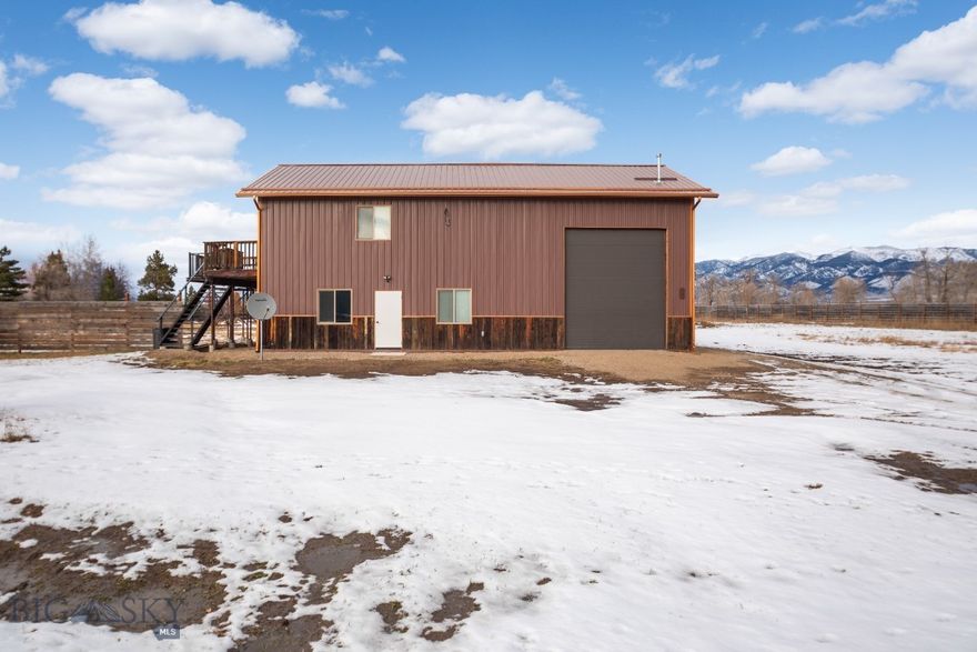 Discover a rare canvas of opportunity situated against the breathtaking backdrop of the Bridger Mountain range. This versatile 3-acre parcel offers a seamless, on site blend of residential and commercial utility, strategically located just minutes from the Bozeman Yellowstone International Airport and the amenities of both Belgrade and Bozeman. The property currently features a sophisticated live-work facility, comprised of a spacious office, an oversized garage, and a curated one-bedroom residence. Previously operating as a successful Airbnb with a strong rental history, this dwelling provides immediate turnkey income or a comfortable landing spot while you plan your future. Benefiting from flexible Neighborhood Commercial zoning, the possibilities are truly endless. Envision constructing your custom dream estate to capture the alpenglow, or expand the commercial footprint to suit your business needs. Whether you seek a private sanctuary with income potential or a strategic base for your enterprise, this property invites you to define your own legacy in the Gallatin Valley.