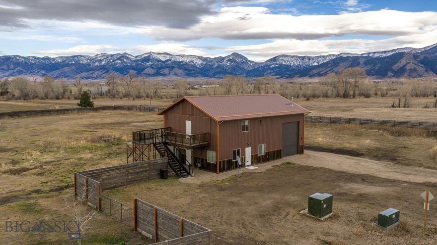 Discover a rare canvas of opportunity situated against the breathtaking backdrop of the Bridger Mountain range. This versatile 3-acre parcel offers a seamless, on site blend of residential and commercial utility, strategically located just minutes from the Bozeman Yellowstone International Airport and the amenities of both Belgrade and Bozeman. The property currently features a sophisticated live-work facility, comprised of a spacious office, an oversized garage, and a curated one-bedroom residence. Previously operating as a successful Airbnb with a strong rental history, this dwelling provides immediate turnkey income or a comfortable landing spot while you plan your future. Benefiting from flexible Neighborhood Commercial zoning, the possibilities are truly endless. Envision constructing your custom dream estate to capture the alpenglow, or expand the commercial footprint to suit your business needs. Whether you seek a private sanctuary with income potential or a strategic base for your enterprise, this property invites you to define your own legacy in the Gallatin Valley.