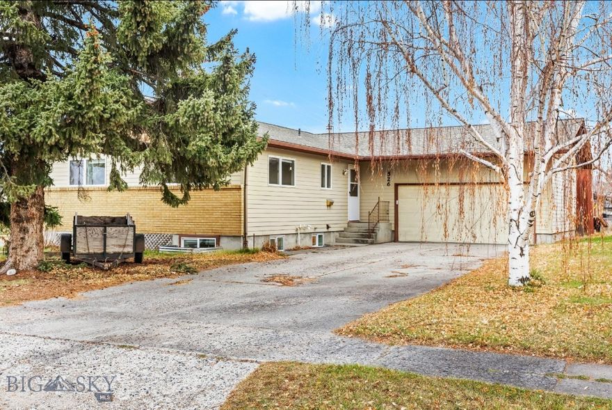 Located near The Elm music venue and some of Bozeman’s favorite midtown restaurants and food trucks, this property offers the best of in-town living. The home enjoys incredible mountain views and a welcoming neighborhood feel. With no HOA, R-1 zoning, and a location just blocks from Bozeman High, this home blends classic character with modern lifestyle just minutes from downtown Main Street. 

Inside, a spacious floor plan includes a full finished basement with tall ceilings and egress, ideal for additional living space, a home office, or guest accommodations. The fireplace and wood-burning stove bring warmth and charm, while a newly installed Navien boiler and air conditioning provide efficient, reliable comfort throughout each of the seasons.

The two-car garage, storage shed, and large driveway provide ample storage and parking options, while alley access adds an additional parking spot and convenience. The home has been thoughtfully maintained over the years, offering a solid and inviting place to settle in and make your own.