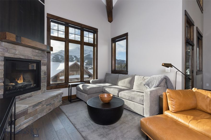 Welcome to 23A Heavy Runner Road, a charming four-bedroom abode nestled in the sought-after Alpenglow Condominiums. This picturesque condo offers stunning vistas of Big Sky Resort and Lone Mountain, providing a backdrop of natural beauty that enchants residents and visitors alike. Tastefully furnished, every corner of this home exudes warmth and sophistication. Completed in 2021, 23A Heavy Runner Road boasts a solid rental history and is the ideal base camp for the outdoor adventures of Big Sky, Montana. This home is the epitome of comfort and sophistication, but also offers easy access to Big Sky Resort, Yellowstone National Park, and beyond. Whether you're seeking a serene mountain retreat, a Big Sky getaway, or a high end short term rental, 23A Heavy Runner Road promises an unparalleled living experience in the heart of Big Sky. Schedule your viewing today and step into a world of mountain luxury.