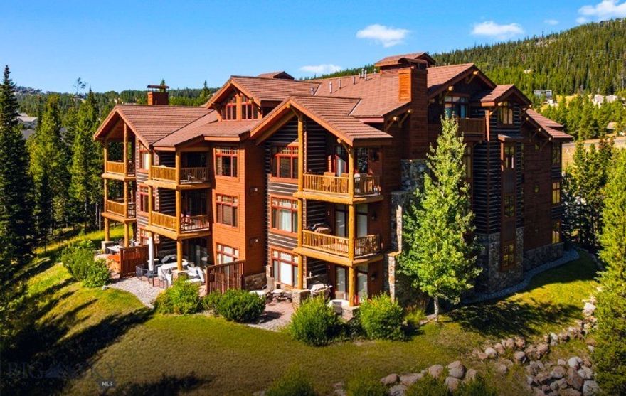 SELLER IS MOTIVATED TO SELL!! 
Offering an unparalleled living experience at the base of Big Sky Resort, this 3-bedroom, 3-bath condominium encompasses 2,007 square feet of elegant mountain living. Every detail reflects thoughtful craftsmanship and timeless design, with radiant heated hardwood floors, knotty Alder doors and trim, granite countertops, and a spa-like master suite with a jetted soaking tub—perfect after a day on the slopes. 

Designed for both comfort and entertaining, the open concept living room, anchored by a cozy fireplace and expansive windows, invites you to gather with friends while taking in breathtaking views of Lone Peak and Lake Levinsky. A covered balcony extends the living space outdoors, providing a front-row seat to Big Sky’s alpine beauty. Each private suite offers its own bath ensuring privacy and comfort. Convenience is unmatched with a private underground single car parking garage, additional outdoor parking, and direct access to the Skyline shuttle stop—ensuring effortless connection to skiing, dining, and resort amenities. 

Beyond your door lies the heart of Big Sky Resort.  Providing a picturesque backdrop of natural beauty that enchants residents and visitors alike.  In winter, enjoy direct access to world-class skiing and snowboarding. In the warmer months, explore hiking in Beehive Basin, biking the Mountain to Meadow trail, kayaking on Lake Levinsky, fly fishing Montana’s legendary Blue Ribbon waters, or venturing into the wild beauty of Yellowstone National Park. This property not only provides a luxurious retreat but also a front-row seat to Big Sky’s year-round adventures. 

Tastefully furnished, every corner exudes warmth and sophistication, The residence is being offered fully furnished and turnkey, with existing rentals already on the books—a rare opportunity for both personal enjoyment and immediate revenue potential. Please inquire for detailed cost of ownership and revenue forecasting. Whether you’re seeking a private getaway, a luxurious base camp for outdoor pursuits, or a high-end short-term rental, this condo is more than a home—it’s your personal retreat in Montana’s most sought-after resort community.