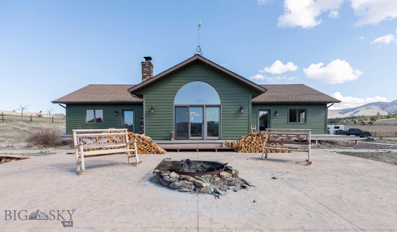Dream Montana property on 20 acres with everything you need for comfortable living and serious horse keeping. There are 20 additional acres for purchase as well. The home offers main-level living with vaulted ceilings, large windows, and an open-concept design that brings in natural light and stunning views. The main level includes a spacious kitchen, cozy living area with fireplace, and a private master suite.
Equestrian features include a well-equipped tack room, multiple stables, fenced pastures, and a professionally built riding arena — ideal for training, leisure riding, or events. Plenty of space for grazing, rotation, and future customization. Additionally, enjoy nearby lake recreation with the private community docks and pavilion. Enjoy privacy, open skies, and the best of Big Sky Country. Whether you're an equestrian enthusiast or simply seeking a serene rural lifestyle, this property offers the perfect Montana retreat. View MLS #405891 for home and larger 40-acre parcel.