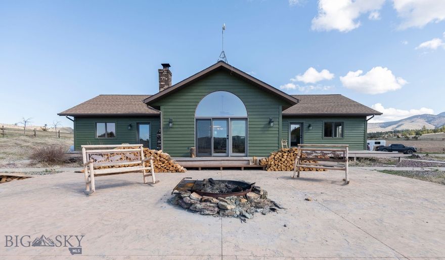 Dream Montana property on 20 acres with everything you need for comfortable living and serious horse keeping. There are 20 additional acres for purchase as well. The home offers main-level living with vaulted ceilings, large windows, and an open-concept design that brings in natural light and stunning views. The main level includes a spacious kitchen, cozy living area with fireplace, and a private master suite.
Equestrian features include a well-equipped tack room, multiple stables, fenced pastures, and a professionally built riding arena — ideal for training, leisure riding, or events. Plenty of space for grazing, rotation, and future customization. Additionally, enjoy nearby lake recreation with the private community docks and pavilion. Enjoy privacy, open skies, and the best of Big Sky Country. Whether you're an equestrian enthusiast or simply seeking a serene rural lifestyle, this property offers the perfect Montana retreat. View MLS #405891 for home and larger 40-acre parcel.