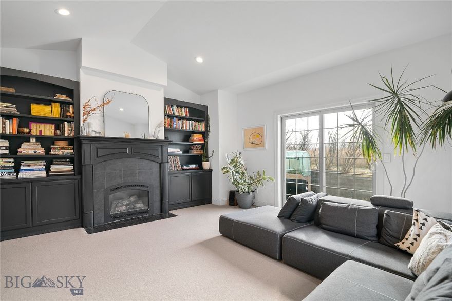 Enjoy the ease of single-level living in this beautifully updated 3-bed, 2-bath townhouse tucked within one of Bozeman’s most desirable neighborhoods. This home combines modern comfort with a serene setting alongside the Bridger Creek Golf Course. Inside you’ll instantly feel at home. Vaulted ceilings create an open, airy feel, and the home’s simple, well-designed layout offers an easy flow from room to room. Refinished floors and cozy wool carpet add warmth throughout. The kitchen features new subway tile, sleek countertops, and a functional layout that flows seamlessly into the living room — complete with a stunning gas fireplace and built-in shelving. The primary bedroom includes an ensuite bathroom with dual sinks and updated fixtures, while two nicely sized bedrooms are located opposite the primary. Modern light fixtures, an HVAC system with central air installed in 2019, and a brand-new roof (2024) provide lasting comfort and efficiency. Outside, enjoy your morning coffee while wildlife wanders through the wetlands behind you, or take advantage of the golf course, Nordic ski trails, and nearby hiking paths just steps away. Story Mill Park, Map Brewing, the Cannery District, and downtown Bozeman are all just minutes from your door — offering endless ways to enjoy the best of Bozeman living. With thoughtful updates, a peaceful setting, and low-maintenance design, this Bridger Creek townhouse is more than a home — it’s a lifestyle that’s hard to find and easy to love.