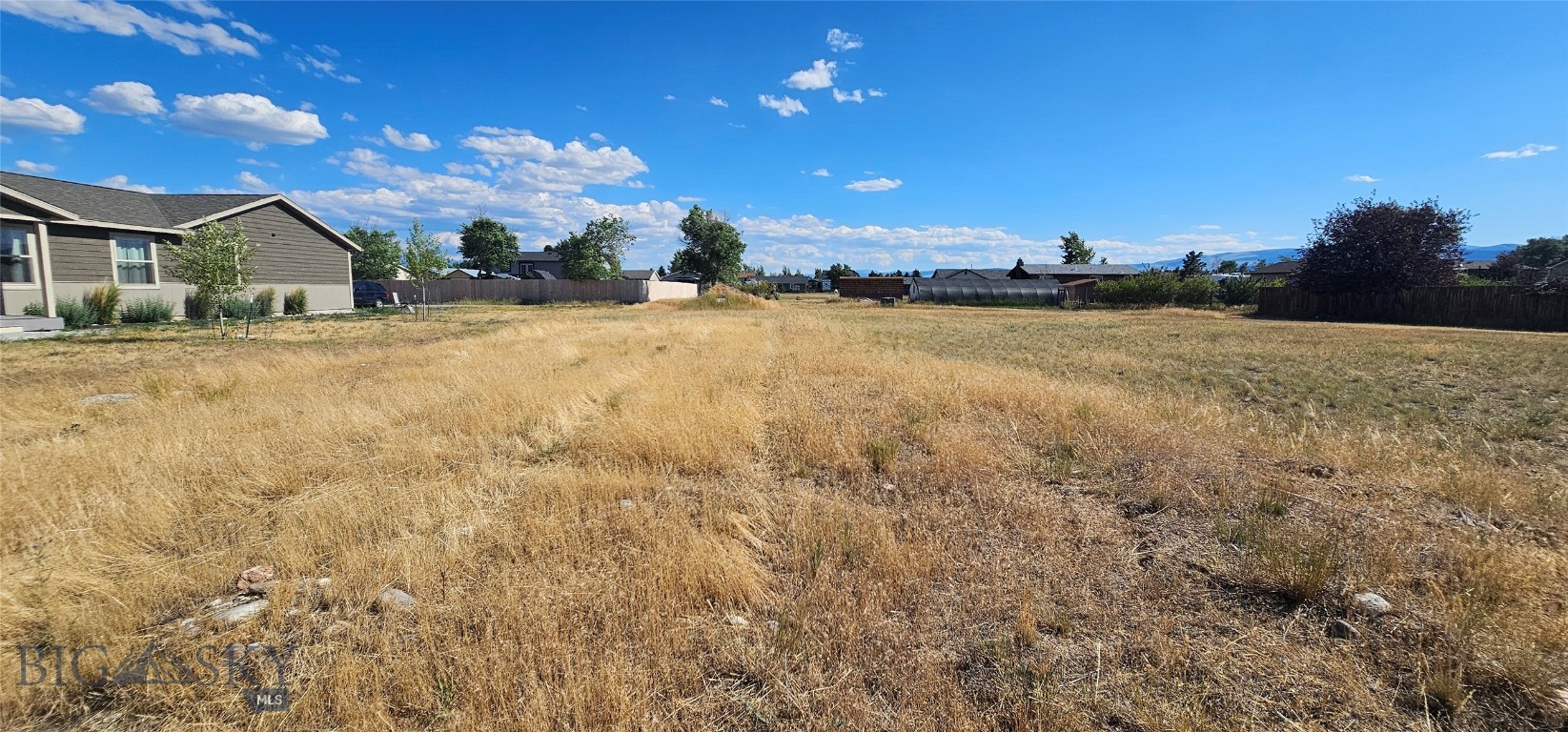 Rare Multi-Family Lot in Ennis!
A unique development opportunity in one of Montana’s most desirable small towns! This .211 acre level lot is zoned for multi-family use and located within the town limits of Ennis, offering outstanding potential for investment, rental income, or a custom duplex or triplex build.
Property Highlights:
Zoned for Multi-Family – Perfect for duplex or triplex
Fully Serviced – City water, sewer, and electricity available at the street—ready for hookup
Prime Location – Walkable to Ennis Schools, hospital, grocery store, restaurants, and Main Street shopping
Outdoor Access – Minutes from the Madison River and Lions Park for fishing, hiking, and recreation
Multi-family lots like this are extremely rare in Ennis—don’t miss your chance to build income-generating housing or your ideal home with rental potential in a growing, vibrant community