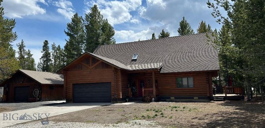 Join the mountain lifestyle. Montana log home in the pines awaits you. Located in desirable Madison Addition Subdivision this is a custom-built log home with tons of rustic charm throughout. This 3-bedroom, 2 full bath home has many extras that make this log home unique and ideal for anyone looking for their West Yellowstone home. An open concept main living space with just the right touches of rustic. Stunning log beams, river rock gas stove, open log staircase, upper-level loft, grand windows, granite counters and so much more bend beautifully. Living made easy with main single level living room, dining area, kitchen, master suite, laundry room and garage access and entry. Upper-level bedrooms, loft/office area, full bath, reading nook and additional loft space above that the young and young at heart will love. Ample outdoor space including a large deck with easy access from the main living space, an upper-level balcony, front covered porch all are perfect for enjoying this extra-large lot in a beautiful residential neighborhood. Attached two bay garage, paved circle drive, carport and detached garage provide ample parking/storage to meet all your needs. Home is located off the main traffic areas of the subdivision all within walking distance of the school, only blocks from West Yellowstone main activities & entertainment, and Yellowstone Park west entrance. Appreciate the open spaces of Montana with opportunities to hunt, fish or even just enjoy the wildlife in Montana makes this a special place. Join the mountain lifestyle in your Montana Log Home you'll be proud to own.  (Subdivision does not allow short term/VRBO style rentals) Schedule your appointment for your tour of this stunning Log Home today.