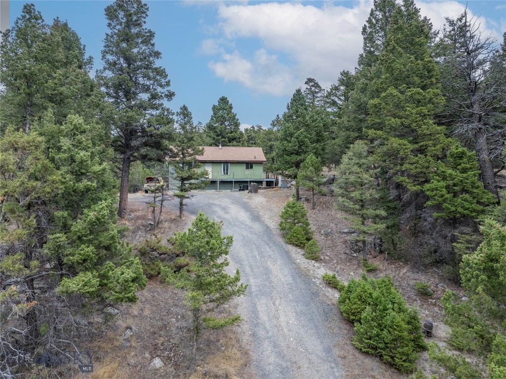 Located just 20 miles from Butte and 16 miles from Whitehall, with National Forest land nearby, this property offers the perfect blend of convenience and seclusion. With a well, septic, and electricity to the lot, it’s ready for your vision—whether that’s building a custom home, a weekend getaway, or a recreational retreat.
The property includes a rustic 1-bedroom, 1-bath cabin on 20+ acres, being sold as-is with some appliances and light furnishings. This property has light covenants and the possibilities are endless. Traditional financing unavailable, inquire with the listing agent about potential purchasing options. Schedule your showing today, please respect the no trespassing sign if you are unrepresented!