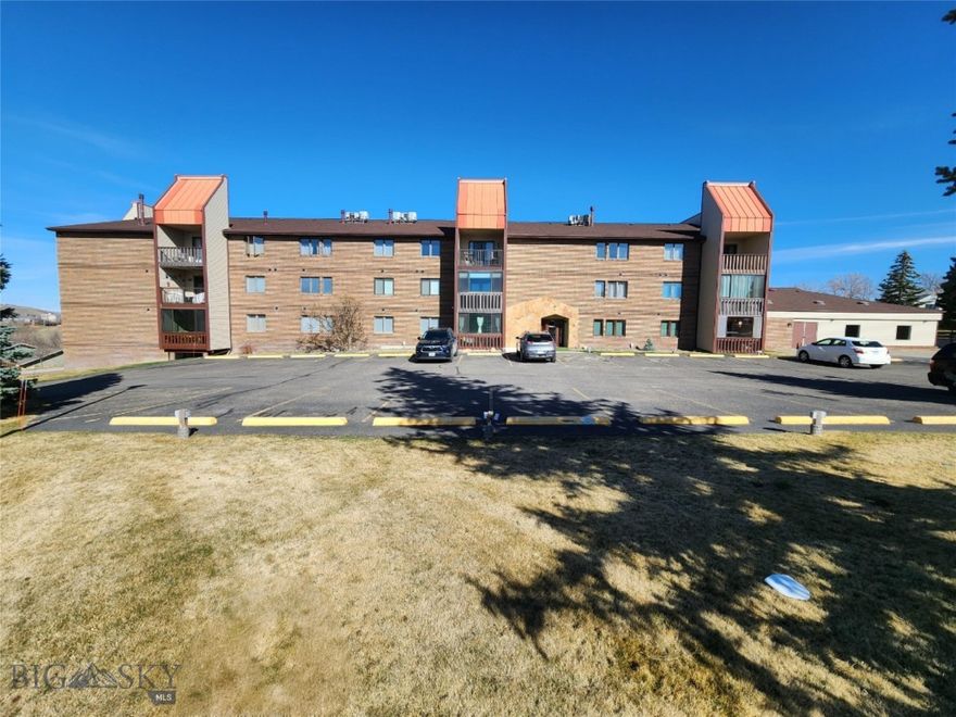 WELCOME HOME TO EASY MOVE IN READY CAREFREE LIVING! Great one level condo on the 2nd floor w/2 bedrooms and 2 bathrooms. Remodeled, the kitchen & dining room have been updated & have newer cabinets, counter tops, lighting, flooring and stainless-steel appliances. Laundry area is on the main level just off the kitchen. You'll find an inviting living room w/a sliding glassdoor leading to your personal private balcony, which looks out to the open green space. Large primary bedroom w/ensuite bathroom having 2 closets, extra shelving & walk in shower with a seat. Close to Benefis West & Peak Health and Wellness Center. The building has self-locking secured access entry w/an intercom system. Central Air. Lots of storage. Elevator will bring you to the condo and to the lower-level heated parking garage, 1 assigned space in the heated garage is just left across from the elevator & another assigned space in the front parking lot. This community features a sauna, a park like exterior setting, a community room for entertaining and Hylande City Park is just down the street.