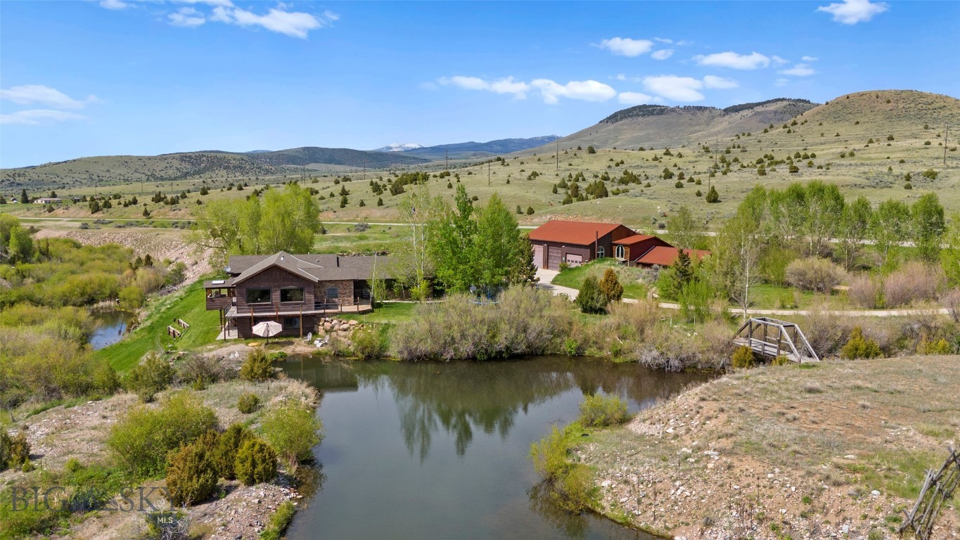 Virginia City, MT, is a treasure trove of history, and this custom home in its Historic District offers a unique blend of old-world charm and modern luxury. Imagine a beautifully crafted residence nestled in the heart of this storied town, boasting breathtaking views of the Ruby Valley and surrounding mountains.
This home is designed for both comfort and functionality, featuring a fully finished basement, theater room and walk in concrete gun safe room! Enjoy a spacious shop perfect for hobbies, storage, or even a workspace. The property is enhanced by serene water features, adding to its peaceful ambiance and making it a true retreat.
Inside, you’ll find vaulted ceilings, a stone fireplace, and a thoughtfully designed layout that maximizes natural light and scenic vistas. Whether you're looking for a permanent residence or a getaway steeped in Montana’s rich history, this home offers an unparalleled living experience.