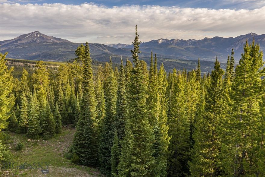 20 Acres with Opportunity for Golf Membership at Spanish Peaks Mountain Club
Discover the pinnacle of Big Sky living at Big EZ Estates, Lot 27—an extraordinary 20-acre homesite within an exclusive gated enclave adjacent to Yellowstone Club and Spanish Peaks Mountain Club. This rare offering presents a coveted opportunity to obtain a Golf membership at Spanish Peaks Mountain Club, further enhancing the appeal for discerning buyers.
Framed by breathtaking natural beauty, Lot 27 showcases sweeping panoramic views of Lone Peak, Pioneer Mountain, and the dramatic Spanish Peaks. The expansive acreage offers an exceptional canvas to create a private mountain sanctuary or an impressive generational estate, all while enjoying privacy, space, and stunning alpine scenery.
Experience the serenity and prestige of Big EZ Estates, where expansive landscapes meet world-class amenities and Big Sky’s most sought-after lifestyle. Don’t miss this chance to own one of the area’s premier legacy properties—schedule your private tour today and begin envisioning your Montana dream home.