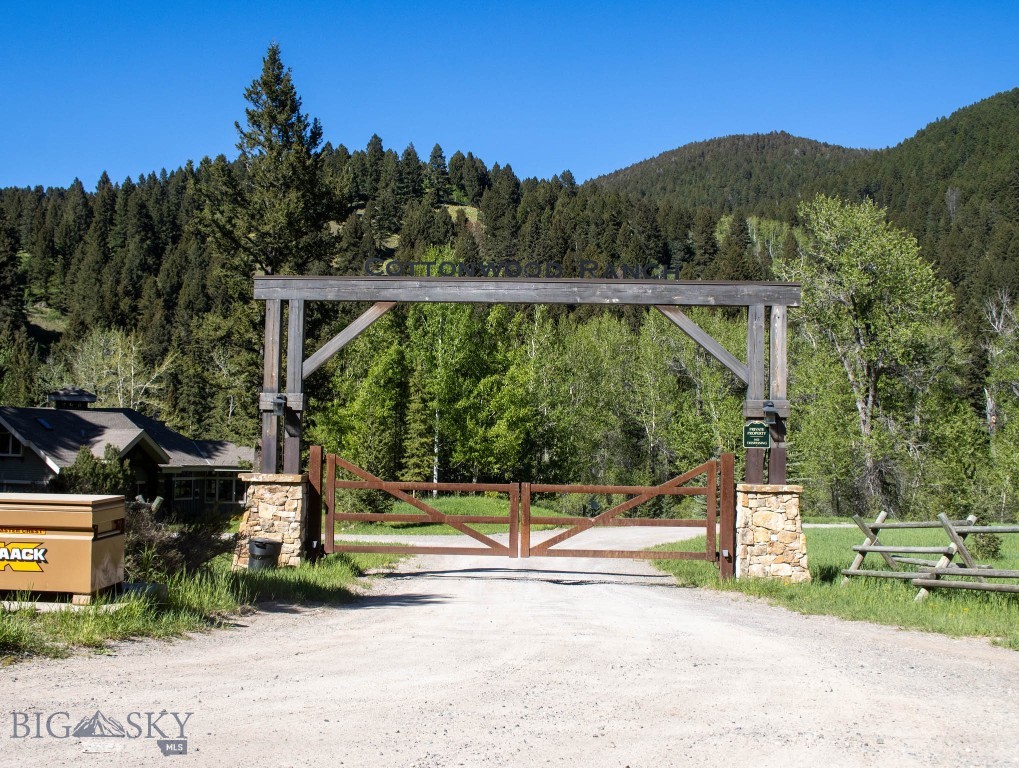 A Lot like this in the exclusive Cottonwood Ranch Trail subdivision is hard to come by; with only 14 lots and each at least 20 acres, these don't come up for sale very often. This gorgeous 21.840 acre provides wide open panoramic views of the surrounding mountain ranges and close up views of the surrounding wildlife and it borders public forest service land which is also hard to find these days. This amazing parcel has so much to offer if you are looking to build your dream home outside of town and amongst the trees. There is a well installed on this property which saves a buyer the expense of the startup of the process of the well. And a dirt driveway is already in place that will take you up to a clearing that can be a build site or a just a wonderful view site! Cottonwood Ranch Trail includes many other high-end homes and it's a gated community which adds to the value and privacy of the homes. Being so close to town (only approx. 20 - 25 minutes) yet so far away; this would be your own private oasis! Big Sky skiing or Bridger Bowl skiing are both close and the South Cottonwood Canyon trail head is just outside the Cottonwood Ranch Trail gate if you want to hike the trail. Your dream home could be nestled in this beautiful canyon; you must see this lovely lot!