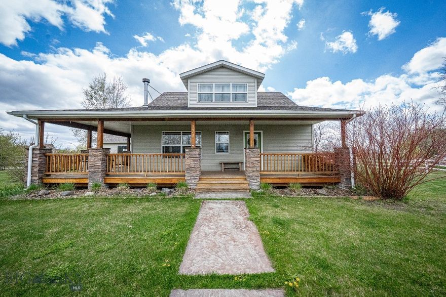 Set on 1.14± acres in a quiet Belgrade neighborhood, this 4-bedroom, 2-bath home offers the space, views, and flexibility that define Montana living. With 1,835± sq ft across two levels, the home features a functional floor plan designed for both everyday comfort and entertaining, with main-level living options and additional bedrooms and loft space upstairs.

Take in sweeping Bridger Mountain views from the wrap-around porch, or unwind in the included hot tub after a day exploring the nearby trail systems. A pull-through driveway, mature landscaping, and inviting curb appeal create a strong first impression, while the fenced backyard offers both privacy and usability.

Inside, a cozy wood-burning stove and abundant natural light create a warm, welcoming atmosphere. The kitchen flows easily into the dining and living areas, making it ideal for gathering, while features like the walk-in closet and ample storage add everyday functionality.

The property is thoughtfully set up for those who value outdoor living and a more self-sufficient lifestyle, with a private well and septic system, underground sprinklers, established garden space, raspberry bushes, rhubarb patch, and mature fruit trees. Whether you're gardening, entertaining, or simply enjoying the open space, this property offers room to live the Montana lifestyle.

Additional highlights include a large 576± sq ft attached garage, a storage shed, and unfinished attic space above the garage, ideal for storage or future expansion. Covenants allow for a shop or additional outbuilding at the rear of the property, offering even more flexibility.

Conveniently located near Belgrade, Bozeman Yellowstone International Airport, and just minutes from the new Story Creek Elementary, this home combines accessibility with the privacy, space, and views that are increasingly hard to find.