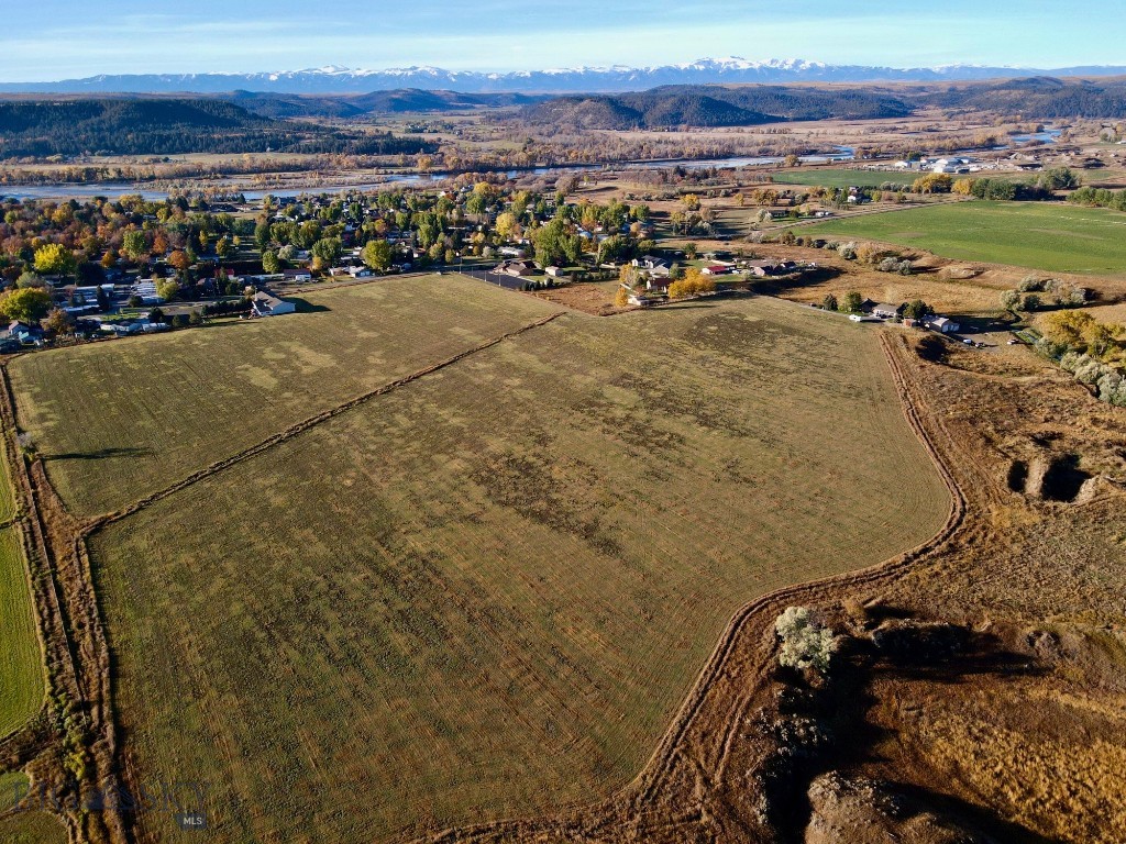 ATTENTION RESIDENTIAL DEVELOPERS, don't miss this rare opportunity to purchase land ready to develop with completed entitlements and supplements. Pioneer Landing would be the first subdivision in many years to be added to the desirable Columbus community and provide the city with much needed housing for its growing population. The approved plans allow for 145 dwelling units and 3 commercial lots. The property sits on the edge of town and is mostly level with a slight break into a varied riparian area with a creek flowing along the northwest boundary. Much of the property has fantastic views of the Beartooth Mountains making for a stunning back drop to this unique opportunity. Go to https://pioneerlanding.community/ to learn more about Pioneer Landing's vision. This property would also be a great setting for a dream hobby ranch. Do not miss this great opportunity.