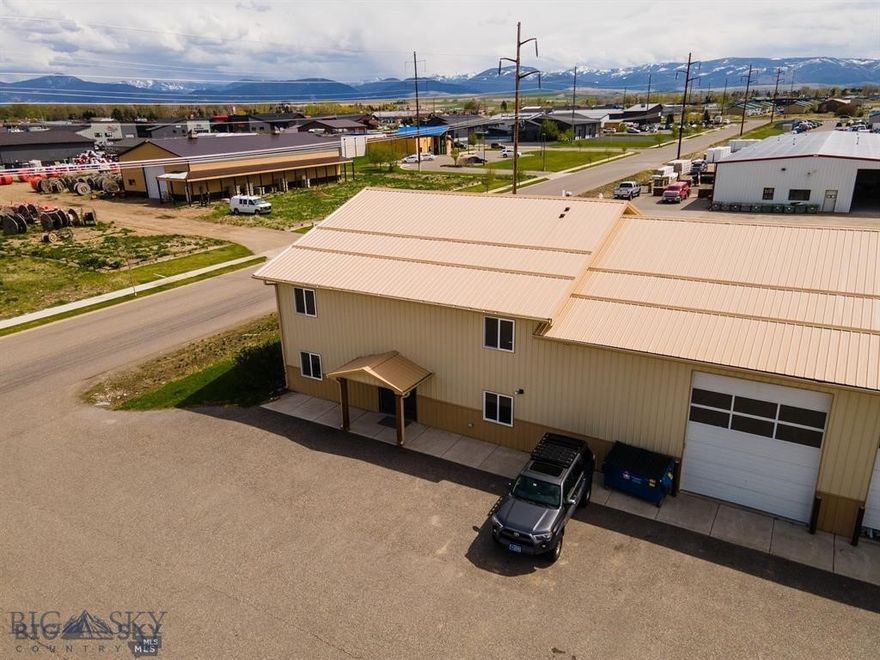 215 Quali Run is a perfect space for a person or business that needs more-- and something better than just average.
Located in 4 corners with ideal access to Bozeman, Big Sky and Belgrade. Units A&B are combined. Unit A, first floor, has a welcoming reception area, 3 large offices, a conference room, a kitchen/breakroom, a bathroom, and a utility area.
The second floor opens up to a huge open rec area. It is surrounded by 2 additional large and bright offices, a bathroom, and a bar with a seating area, which has been supplied with many high-quality commercial kitchen appliances from a previous tenant improvement. Unit B is a directly connected, heated, and clean warehouse area offering 1500 sq. ft. of storage for whatever you will need. Unit B has its own external 14' garage door. This is a versatile office/commercial space right in the bullseye of the Gallatin Valley commerce corridor. Each unit has dedicated parking.