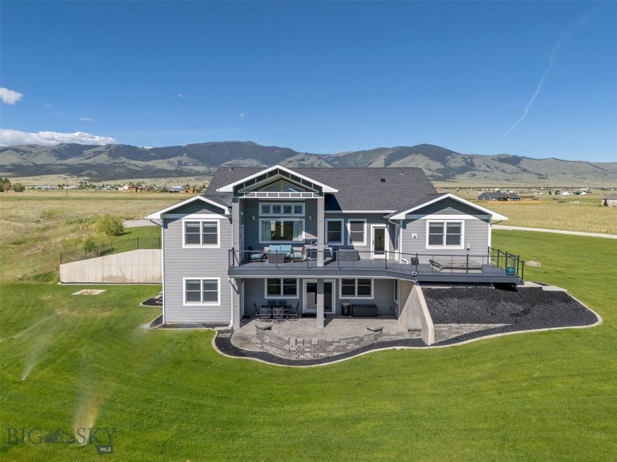 This remarkable property overlooking Canyon Ferry lake embraces luxury living at its finest. Situated on nearly 7 acres, the 5328+/-  SF custom home is absolutely stunning, with high quality construction and added amenities and features not commonly found. During the design and build phase, if the owners thought they needed it, they did it. Walking into the main level, you're immediately greeted by the vaulted living room ceiling, attractive tile floors, an 8' wall mounted fireplace, open dining area and a gourmet kitchen. The kitchen has an array of cabinets, gas range top with pot filler, double oven, large center island, granite countertops, under counter and cabinet lighting, and a hidden butler's pantry with additional freezer. There are 3 bdrms, including a spacious master bedroom and ensuite bedroom, both with large walk-in closets, beautiful showers and entrances to the deck. The spacious covered deck overlooks the lake with tremendous views of the mountains beyond. Providing morning sunshine and evening shade, it's a perfect place for peaceful relaxation. The basement is an entertainment mecca. The main area has an extravagant wet bar, with seating for approx 10, a fridge, kegerator, ice maker, dishwasher and microwave. A large projection TV and hookups for several wall mounted TVs offer a great place to enjoy movies or watch sports. There's also a workout room, 2 guest bedrooms and a full bath. The entertainment room walks out onto the covered patio and lawn for outside enjoyment. In addition to the attached 3 car heated garage, a 40' x 66' heated and insulated shop provides storage for boats, RVs, or ATVs. The shop ceilings are 16'. There are three 12' and one 14' overhead doors in the main shop area, as well as another 14' door for the separate RV bay. There's also a bathroom, an outside 30A RV receptacle and dump station with a dedicated septic tank. Additional amenities include in-floor radiant heat throughout the house, A/C, whole house surround sound system, underground sprinklers, two 1000 gallon buried propane tanks, horseshoe pits, propane plumbing to patio and upper deck for grilling, spray foam insulation in home and shop (including privacy insulation in the master and ensuite bedroom walls). Located in a desirable subdivision within a few minutes of the Silos boat ramp and recreation area, this property checks off a lot of boxes for those looking for lake life, recreation, views, elbow room, and the true enjoyment of Montana living.