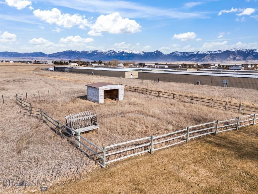 605 E Cameron Bridge Road is a 5.22-acre parcel with an existing 2,500-square-foot residence, located northwest of downtown Bozeman off Jackrabbit Lane. The site is within minutes of Bozeman Yellowstone International Airport and the Highway 191 corridor. No HOA. Private well and septic in place.
The existing structure is a two-story, three-bedroom, 2.5-bath home built in 1992 with an 800-square-foot attached two-car garage. It is currently habitable and could support owner-occupancy, a caretaker arrangement, or interim rental while a buyer evaluates longer-term use. Forced air gas heat, asphalt roof, engineered wood and tile flooring throughout most of the main level.
The land is the asset. Five-plus contiguous acres this close to downtown Bozeman and the airport does not come together often. The site is flat, partially fenced, with a ditch water amenity on or touching the property. A gravel driveway and dirt/clay road access serve the parcel currently. Mountain views to the south and west.
5.22 acres. Existing 2,500 SF structure with garage. Private well and septic. No HOA or subdivision restrictions noted. 2025 property taxes: $3,624. Asking $1,350,000. Buyer to verify zoning and allowable uses with Gallatin County.