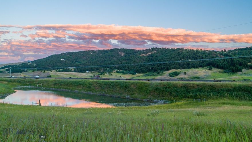 Outstanding 20+ acres located in the mountains in the Bozeman Pass Area in Park County between Bozeman and Livingston now available!  This land offers you great views of the surrounding mountains with lush meadows and even access to a small pond. This lovely property would be a great home site for someone looking for mountain living.  It has convenient access from I-90, is just 10 miles west of Livingston and 15 miles from Bozeman! Power is on the west property boundary. Wildlife sightings are a regular occurrence including deer and elk. This property borders a year-round spring fed pond that livestock can drink from, but it also is a great attraction for frequent wildlife visitors! Mild covenants that allow for livestock. The property is already perimeter fenced. This is a breath-taking setting situated where the Gallatin Mountains meet the Bangtails and is a super location for the outdoor enthusiast with many recreational opportunities. Yellowstone National Park is just an hour to the south with its geysers, hot springs and wildlife. Bozeman is 15 miles to the west and Bridger Bowl ski area is just 20 miles away.