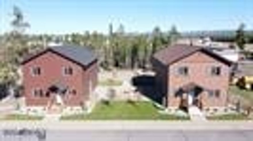 Prime investment opportunity just 8 blocks from Yellowstone National Park’s West Entrance. This fully furnished, turn-key short-term rental property includes two modern 4 bed, 3 bath cabins (built in 2020), each offering over 2,000 sq ft of living space. Designed with guest comfort and privacy in mind, both units feature open-concept kitchens, spacious living areas, game rooms, and fireplaces. The two homes share a beautifully landscaped yard with a large herringbone paver patio and fire pit—perfect for entertaining groups of up to 16 under the stars. Zoned and sized to allow for the construction of two additional homes, this 0.34-acre parcel offers significant expansion potential and long-term upside. Whether you're looking to grow a short-term rental portfolio or capitalize on the growing West Yellowstone market, this rare multi-unit opportunity blends income, location, and future development.