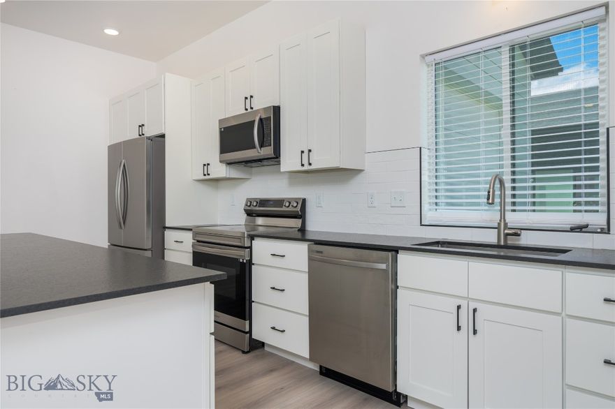 Discover a thoughtfully designed floor plan at 209 Pearl St. This home features a spacious open-concept kitchen and living area ideal for entertaining guests. The generous master suite boasts a walk-in closet and a beautifully tiled shower, providing a private retreat. You'll also find a spacious guest bedroom and a versatile bonus room that can serve as a home office or easily be converted into an additional bedroom. With 10-foot ceilings throughout, the home exudes a sense of grandeur and spaciousness. The convenient entry from the garage leads directly into the laundry room, offering extra storage solutions. This luxurious residence showcases sleek cabinetry, stunning granite countertops, and durable laminate flooring in the main living areas, complemented by plush carpeting in the bedrooms for added comfort. Experience the charm and elegance of this incredible home!