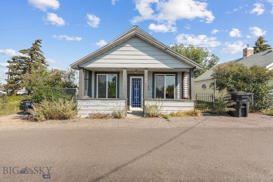 Charming Uptown Butte Bungalow. This 2-bedroom, 1-bath bungalow, built in 1920, offers 908 square feet of thoughtfully arranged living space filled with character and warmth. Nestled in a peaceful uptown neighborhood, the home blends vintage charm with everyday functionality, making it an ideal choice for those who appreciate history and simplicity wrapped in comfort. From the moment you arrive, the inviting front porch welcomes you to slow down and enjoy sweeping views of both sunrises and sunsets over the surrounding mountains. The home overlooks the Uptown Butte historic district, where rich architectural heritage meets a vibrant community atmosphere. Here, you’re just minutes from local dining, shops, and cultural attractions while still enjoying the serenity of a quiet street. Inside, the efficient floor plan provides cozy gathering spaces and an intimate feel that makes the home perfect as a primary residence, a weekend retreat, or even an investment opportunity. The property’s character and setting make it an excellent option for those seeking to experience the best of Montana living—authentic, comfortable, and timeless.