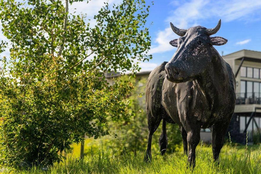 One of the last remaining lots on the water this spectacular lot in the prestigious Black Bull Community is an exceptional opportunity to build the custom Montana home of your dreams. Perfectly positioned in one of the state’s premier private golf communities, this property combines the serenity of Big Sky Country with unmatched access to luxury amenities and outdoor adventure. Set against a backdrop of expansive mountain views and open skies, the lot offers a peaceful, picturesque setting ideal for designing a residence that blends seamlessly with the natural beauty that surrounds it. Whether you're envisioning a contemporary mountain retreat or a rustic yet refined home with warm, inviting finishes, this site provides a blank canvas with endless potential. As a resident of the Black Bull Community, you'll enjoy exclusive access to the award-winning Tom Weiskopf-designed championship golf course—one of Montana’s most celebrated and thoughtfully designed courses. With rolling fairways, stunning scenery, and a layout that offers both challenge and enjoyment for golfers of all skill levels, the course is a true centerpiece of the community. Beyond golf, Black Bull is known for its top-tier amenities that cater to a vibrant, active lifestyle. Residents have full access to a private clubhouse that serves as a social hub for the community, a resort-style swimming pool, a fully equipped pro shop, and a modern fitness center outfitted with state-of-the-art equipment. The community’s thoughtful design and amenities make it easy to connect with neighbors and enjoy a lifestyle that’s as relaxed or as active as you desire.