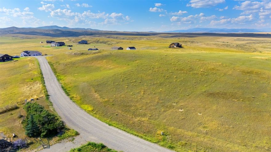 Don't miss this 1.5-acre lot that offers a beautiful setting with wide-open rolling hills and panoramic mountains views. Conveniently located, this lot is just a 35-minute drive via I-90 to Manhattan, Belgrade, Bozeman, and the Bozeman Yellowstone International Airport, and only 45 minutes north on US 287 to Canyon Ferry Lake. Missouri Headwaters State Park in Three Forks is just 10 minutes away, providing easy access to outdoor recreation and scenic landscapes.  Whether you’re seeking a peaceful rural atmosphere or a central location to some of Montana’s most vibrant communities, this lot provides an excellent opportunity to create the home you envision.