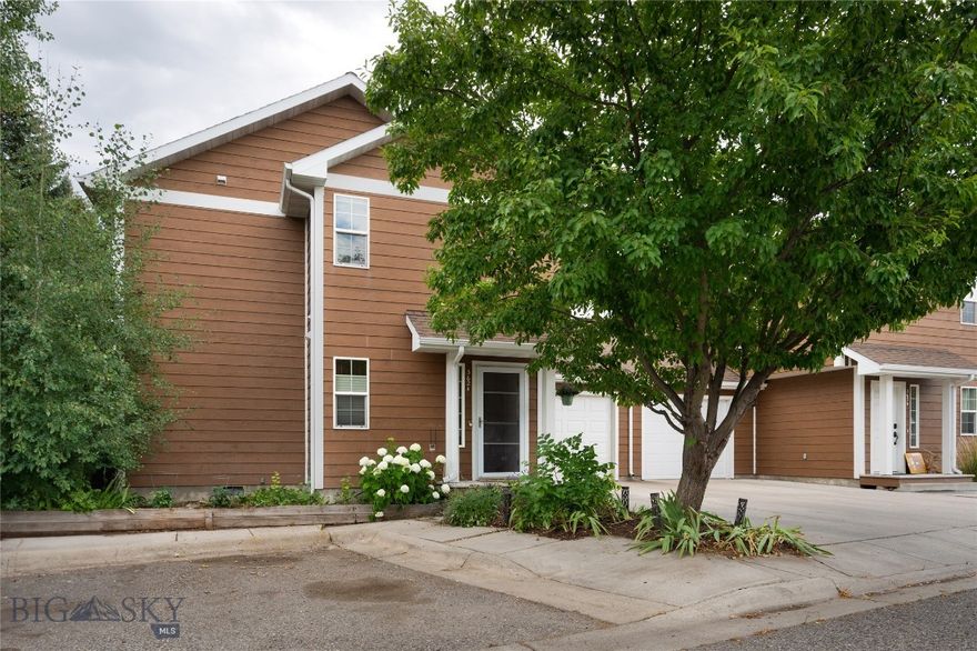 Investors, MSU Parents, Buyers! Compare with other condos and discover that the ONLY shared wall is between the two garages in this duplex-styled 3 bed, 2.5 bath condo! Otherwise it is very much like a stand alone two story condo AND it's on a cul-de-sac so NO through street traffic. Truly a gem with hardwood floors on the main level, open floorplan, spacious eating bar for entertaining friends and family, generous storage and closets, plus a generous sized half bath. Upstairs is a primary suite, complete with full bath along with two other bedrooms and another full bath. Upper level has carpet and a separate laundry/utility room. Heat is gas boiler with hot water baseboard heat - super efficient type of heat with no air flow to blow dust around, plus a gas fireplace for those cool fall or winter evenings. Very useful space and plenty of cabinetry in the horseshoe shaped kitchen with gas range, countertop microwave, stainless steel refrigerator and dishwasher. Two main floor closets in the hall are used for extra pantry space.  Outdoors features a concrete patio off the dining area, perfect for summer evenings, along with a gas plumbed BBQ grill that will stay with the condo. Yard areas are mowed, watered and maintained by your HOA dues so you can get out and play! A lovely park area with playground equipment is just down the street. Out your front door you have mature lavendar and beautiful white hydrangeas growing in addition to a garden space for more flowers or vegetables, along with a beautiful mature shade tree.  Built in shelving and workbench in garage will stay. Centrally located in Bozeman and close to everything. Short distance to downtown Bozeman, MSU campus, shopping, restaurants and breweries.