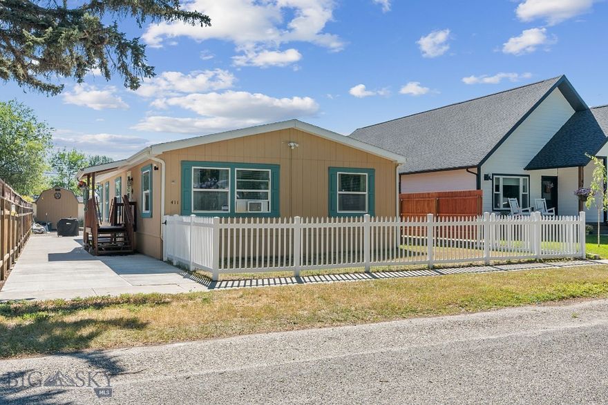 This light and bright 3-bedroom, 2-bathroom modular home offers 1,624 sq ft of beautifully updated living space. Ideally located in the heart of Three Forks so you can walk anywhere in town. Fresh paint, newer carpet  and newer grey wood-style vinyl plank flooring gives this home a clean, upgraded feel. 

The spacious master en suite features a large walk-in closet and an updated private bath with stylish fixtures. The open-concept kitchen includes a breakfast bar and a reverse osmosis drinking water system. The popular single level floor plan adds convenience with a dedicated mudroom and laundry area just off the back entrance. The second full bathroom is perfect for family or guests.

Enjoy easy, low-maintenance living with a newer roof (2021), fresh exterior paint, Leaf filter gutter system, and a new privacy fence. The vinyl  fenced yard is ideal for pets.

Out back, a large concrete parking pad provides ample room-including RV parking with its own power hookup. A handy storage shed adds even more space for tools or toys.  Easy alley access makes coming and going a breeze.

Located less than a block from the city park with pickleball courts, pool, and playground, this turnkey home is exceptionally clean, meticulously maintained, and full of thoughtful upgrades! Going fishing in the Three Forks ponds that are right around the corner. Home is equipped with Simpli Safe security system. Some pictures are of area amenities.

Call your favorite Realtor for a tour today.