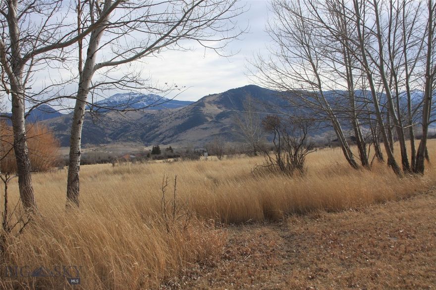 Make your country home dreams come true!  4+ acres in the beautiful Jefferson River valley with outstanding views of the Tobacco Root, Highland, and Bull Mtn ranges. A quiet rural setting features productive meadow pasture and mature trees ideal for a few horses, cows, 4-H projects, pets, etc.  Perimeter fenced and a seasonal irrigation ditch through the property offers livestock water but no irrigation rights.  Property includes an historic 1,500+/- sq ft farmhouse that has been gutted and can be renovated or removed + 3 wells, septic, electricity in place but their condition unknown. 2 large shop / garage / storage buildings (24x96 & 24x62) with concrete floors, metal siding & roof offer many possible uses.  

Live and play here with National Forest nearby and fish the Jefferson River just a mile down the road!

Easy paved access - about 10 minutes to Whitehall for K-12 schools & all services; then an easy 30 minute commute to Butte, or 60+/- minutes to Bozeman or Helena for work or play.  

NO Covenants.