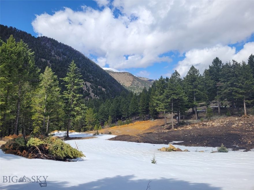 Three adjoining gently sloping – treed parcels of land (Lot 29 – 0.56 acres, Lot 30 – O.55 acres, & Lot 31 – 0.48 acres) located in the unincorporated community of Mammoth, Montana – a mining community where over 14 million dollars of gold and silver has been extracted.  These parcels, totaling 1.59 acres (owners will NOT sell separately), are located in the South Boulder River Valley and are 11+/- miles to Montana Highway 359 up into the northern end of the Tobacco Root Mountains at over 6000’ of elevation.   Surrounded by a larger land owner, you will find this a great location to build your summer cabin or year round residence if you are a snow lover.  Power is across the road from the property and there are multiple building locations on the three lots....build on one and use the other two for elbow room and or future investment.  Minutes from National Forest (hunting, hiking, horseback riding), the South Boulder River or the Jefferson for fishing, and miles of trails for recreational FUN!    In Montana you don’t just buy a property you purchase a new lifestyle – create yours today!