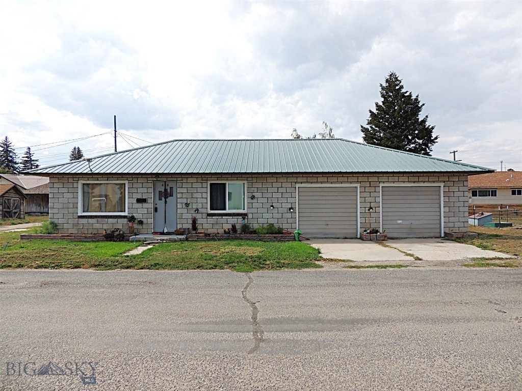 Cozy 2 bedroom home on a 9888 sqft lot, perfect for a starter home, with room to park your toys. Home has a newer roof and is located close to school and downtown Deer Lodge. Property can use some TLC, but make it your own little haven. Seller is motivated, so bring us an offe