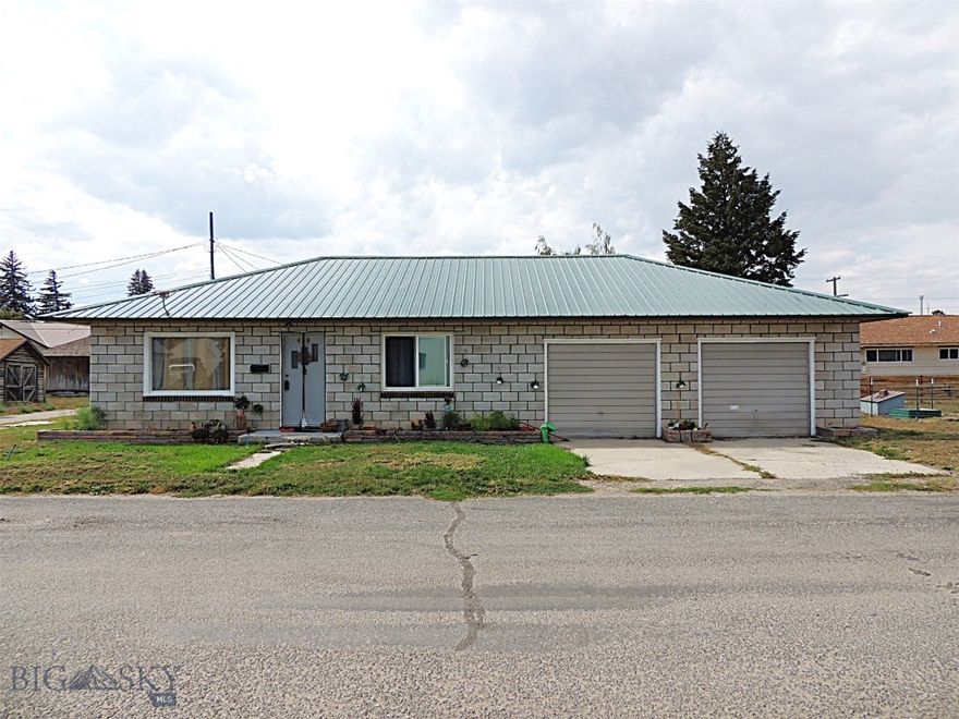 Cozy 2 bedroom home on a 9888 sqft lot, perfect for a starter home, with room to park your toys. Home has a newer roof and is located close to school and downtown Deer Lodge. Property can use some TLC, but make it your own little haven.  Seller is motivated, so bring us an offe