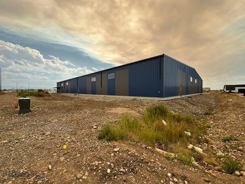 This under construction 15,000 sf warehouse building that will consist of 1 secure loading docks, 1 (12'x14') overhead doors, 3-man doors entrances, small office space, fire suppression, 20' to 25' ceiling height, and 3 phase power (200-amp service). ESFR sprinkler system designed to protect 20’ high storage of Class IV commodities and Group A plastics on racks or on piles. Anticipated completion is 2/15/2026.