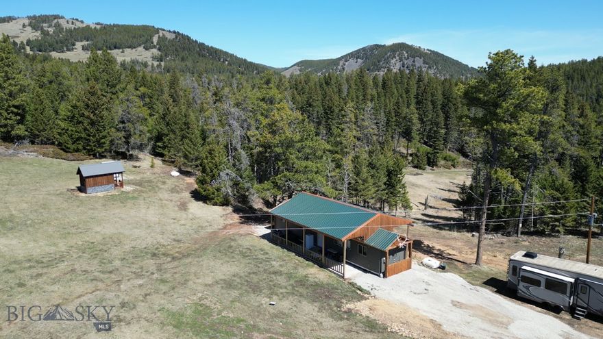 Tucked into the rugged beauty of the Judith Mountains, this acreage offers a rare opportunity to own fully functional hunting land and recreational property in the highly sought-after Game Management Unit 412. Positioned within over 420,000 acres of isolated mountain ranges, this property sits in prime wildlife habitat featuring Douglas-fir, lodgepole pine, and cottonwood—supporting elk, deer, bear, moose, and mountain lions.

The terrain offers a desirable mix of timbered slopes and open clearings, creating ideal bedding cover and feeding zones for big game. Water is a standout feature here, with a man made pond and Maiden Creek running through the property, an uncommon advantage in this region to draw in wildlife.

Unlike many properties, this parcel is already equipped with power, septic, and water available for domestic use, significantly increasing its usability and long-term value. Access is secure and convenient via a gravel road and gated entrance. Improvements include a 2-bedroom, 1-bath trailer with a storm-proof cover, allowing for year-round protection and a shaded porch space to enjoy the landscape. Keep all your equipment in the storage shed and 2 conexes!

Steeped in Montana history, these parcels were once mining claims dating back to the early 1900s, inactive since before World War II. Today, the land offers privacy, recreation, and investment potential. Whether you're seeking a hunting basecamp, mountain retreat, or build-ready rural property, this land is ready to use.

Property Highlights


Located in GMU 412 – premier hunting district
Elk, deer, bear, moose, and mountain lion habitat
Maiden Creek 
Power, septic, and domestic water already in place
Gravel road access with gated entry
2 bed / 1 bath trailer with storm protection structure
Timber + open terrain mix for hunting and recreation
Historic former mining claims
Ideal hunting basecamp or buildable land