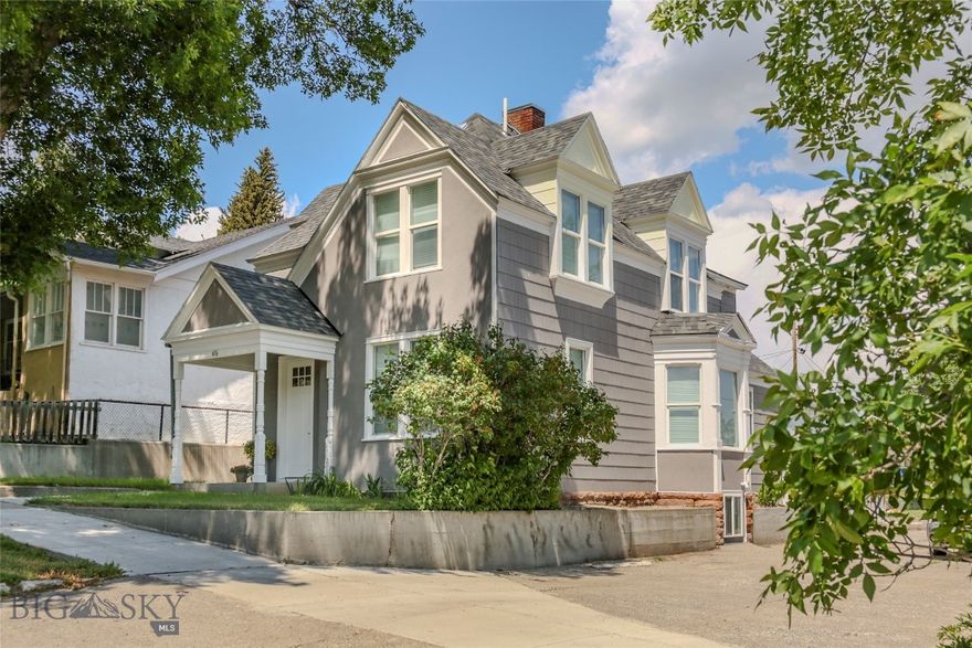 Step into this beautifully revived home that perfectly balances timeless charm with modern comforts. Original wood floors, high ceilings, refinished doors and hardware, and a pretty stained-glass window preserve the home's rich history, while updates to the electrical, plumbing, insulation, and more ensure worry-free living. The fully remodeled kitchen features new appliances and finishes, complimented by updated bathrooms on both levels. A modern gas forced air furnace and water filtration system add to the home's comfort and efficiency. The sunny main floor flex space is ideal as a bedroom, office, or playroom, while upstairs offers three bedrooms and a full bath with a double sink vanity for extra convenience. At the back of the home, you’ll find a generous laundry room with a built-in desk, two large storage closets, and a roomy mudroom that opens to the new deck. The large backyard, with alley access, offers endless potential: landscape to your taste, build a garage or ADU, or simply enjoy the wide open space. Located at the dead end of North Third's lower hill, the property offers stunning views of Livingston Peak from the upstairs bedrooms and glimpses of the mountains from the kitchen and desk, all while being just minutes from vibrant downtown Livingston. This rare blend of historic beauty and modern upgrades is truly move-in ready. Don’t miss your chance to own this exceptional home - schedule your private showing today!