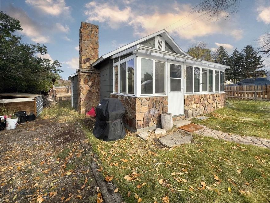 Welcome to your next investment opportunity! This delightful 2-bedroom, 1-bathroom house offers a unique blend of charm and potential, making it the perfect flip house for savvy investors or a cozy home for those looking to make it their own. The unfinished basement gives the opportunity to add extra living space.  Enjoy your morning coffee in the south facing spacious sunroom.  There is plenty of space in the two car garage for your vehicles and toys. Nestled conveniently across from a lovely park, this home is ready for your creative touch!