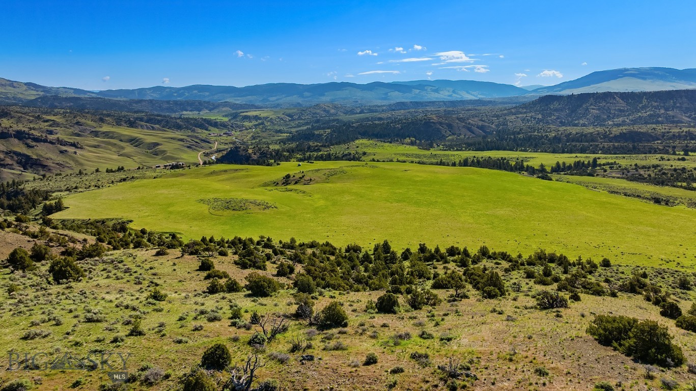 Welcome to an exceptional 654±/- acres offering in the hills of Maudlow, Montana—a rare combination of agricultural pasture ground and premier hunting habitat. Nestled in a remote and private setting, this property is surrounded by expansive cattle ranches, offering both seclusion and a sense of the wide-open West. The land features rolling meadows, timbered ridges, and coulees that provide excellent cover for wildlife. It’s a true sportsman’s paradise, supporting healthy populations of elk, mule deer, and other game. Whether you’re an avid hunter or just enjoy the outdoors, the diversity and quality of habitat here are outstanding. In addition to its recreational value, the property also supports agricultural use, capable of running small herd of animal units during the summer grazing season. A conservation easement is in place, helping preserve the landscape while allowing for continued ranching and recreation. Adding to its appeal is a comfortable off-grid hunting cabin—perfect for extended stays during hunting season or a quiet getaway throughout the year. Located roughly an hour from Bozeman and just 35–40 minutes from Yellowstone International Airport, this property offers both privacy and access. If you’re looking for a legacy piece of Montana—rich in wildlife, agricultural utility, and natural beauty—this is it. (Land ID link attached as virtual tour.)