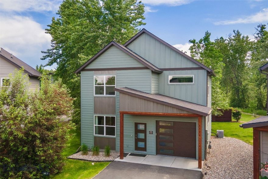 Enjoy the ease of a lock-and-leave lifestyle without sacrificing the space and privacy of a single-family home. Ideally positioned within the community, 26 Locomotive Loop is a well-maintained, detached condo offering a great start or productive investment opportunity. This 3-bedroom, 2.5-bath residence backs to a trail system leading to the Gallatin River, with mature trees providing exceptional privacy—an uncommon and highly desirable feature. The interior features quartz countertops, white cabinetry, and stainless steel appliances, creating a bright, modern kitchen that’s both functional and timeless. Upstairs, the conveniently located laundry sits just outside the spacious primary suite, which includes heated tile floors and a beautifully tiled walk-in shower. Two additional bedrooms are generously sized and feature ceiling fans, complemented by central air conditioning throughout the home. An extra-deep, attached single-car garage provides ample space for storage, gear, or seasonal items—adding even more practical value. Whether you’re seeking a low-maintenance primary residence or a smart investment in a high-demand area, this home offers comfort, convenience, and long-term potential in one exceptional package.