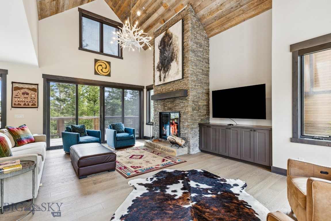 Welcome to The Highlands — the premier ski-accessible neighborhood within the exclusive Spanish Peaks Mountain Club. Ideally located at 146 Outlook Loop, this well maintained, and beautifully appointed 4-bedroom, 4.5-bathroom residence offers the perfect blend of luxury, privacy, and convenience in the heart of Big Sky.
Perched at the top of the neighborhood, the home enjoys mountain views thru the trees overlooking the Spanish Peaks community and the Montage Big Sky hotel. With no home directly across the street, owners benefit from a sense of privacy and direct ski-in/ski-out access via a groomed trail just steps from the front door and moments from the Highlands Lift.
Designed for comfort and connection, the residence features a spacious open concept living area with a soaring vaulted ceiling, a stone fireplace, and seamless indoor-outdoor flow. Multiple outdoor decks — including a private hot tub area — invite you to relax and take in the mountain scenery in every season.
As a homeowner, you’ll enjoy access to the world-class amenities of Spanish Peaks Mountain Club, including private ski terrain, two golf courses (with golf membership), tennis courts, pickleball courts, fitness centers, swimming pools, and elevated dining experiences at the Clubhouse. Preferred access to the five-star services and offerings at Montage Big Sky further enhances the lifestyle, while the soon-to-open Aspire Lodge — a 28,000-square-foot amenity center featuring a restaurant, fitness facility, basketball court, climbing wall, 2 outdoor pools, and more — will be just a short walk from your front door. Completion is anticipated in early 2026.
Whether you're seeking a full-time residence or a luxurious mountain getaway, 146 Outlook Loop is a rare opportunity to own a premier ski-accessible home in one of Big Sky’s most exclusive neighborhoods. With direct access to skiing, hiking, biking, golf, and exceptional amenities, this Highlands retreat is ready to become your family’s Montana legacy. Membership at Spanish Peaks Mountain Club required upon closing.