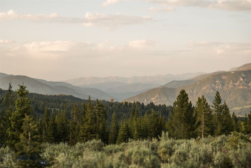 Exceptional 20-Acre Homesite in Big EZ – Iconic Views, Ultimate Privacy & Premier Club Access

Nestled within one of Big Sky’s most exclusive gated enclaves, this remarkable 20-acre parcel offers sweeping southern vistas, featuring dramatic mountain views that extend deep into Yellowstone National Park.

Situated in the prestigious Big EZ neighborhood, owners enjoy not only their own private acreage but also exclusive access to 160 acres of deeded open space, serene trout ponds, and a direct connection to the Gallatin National Forest, providing a private gateway to endless hiking, wildlife, and backcountry adventure.

The gently sloping topography invites the creation of a legacy mountain retreat, blending wide-open privacy with the sense of community found in this tightly held, high-caliber neighborhood.

Adding to the appeal, this parcel offers the rare opportunity to apply for a Charter Golf or Ski/Social Membership to the Spanish Peaks Mountain Club—subject to approval, deposit, and applicable dues and fees (membership must be secured prior to closing). This Club membership is independent from Big EZ HOA dues and opens the door to one of the most sought-after lifestyle offerings in the Rockies.

This unique blend of natural beauty, recreational access, gated security, and Club amenities makes this one of the most compelling homesite opportunities in all of Big Sky.

Photos feature the property itself, the scenic approach, nearby trout ponds, and the surrounding wilderness.

Listing Broker is a member of the ownership LLC.