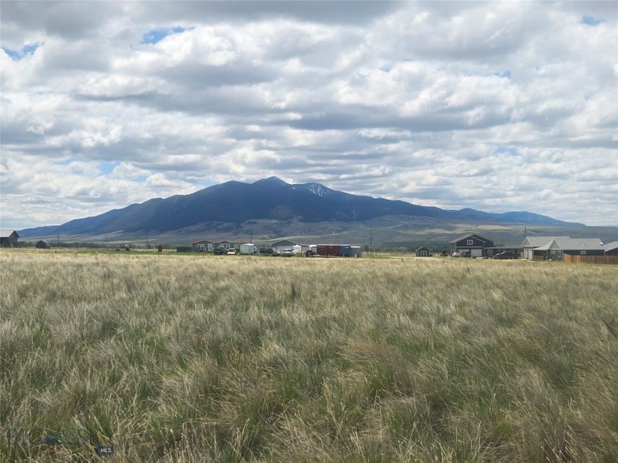 One acre lot (AND the adjoining lot) available! Modular & manufactured homes are allowed. A shared domestic well is in place. Conveniently located between Sheridan and Twin Bridges, this parcel provides the feel of country living, but with amenities just minutes away. 360 degree mountain views of the Ruby Valley greet you in all directions. Bring the plans for your dream home and enjoy the beautiful views and lifestyle of Southwest Montana. The adjoining lot that shares the well is also available.