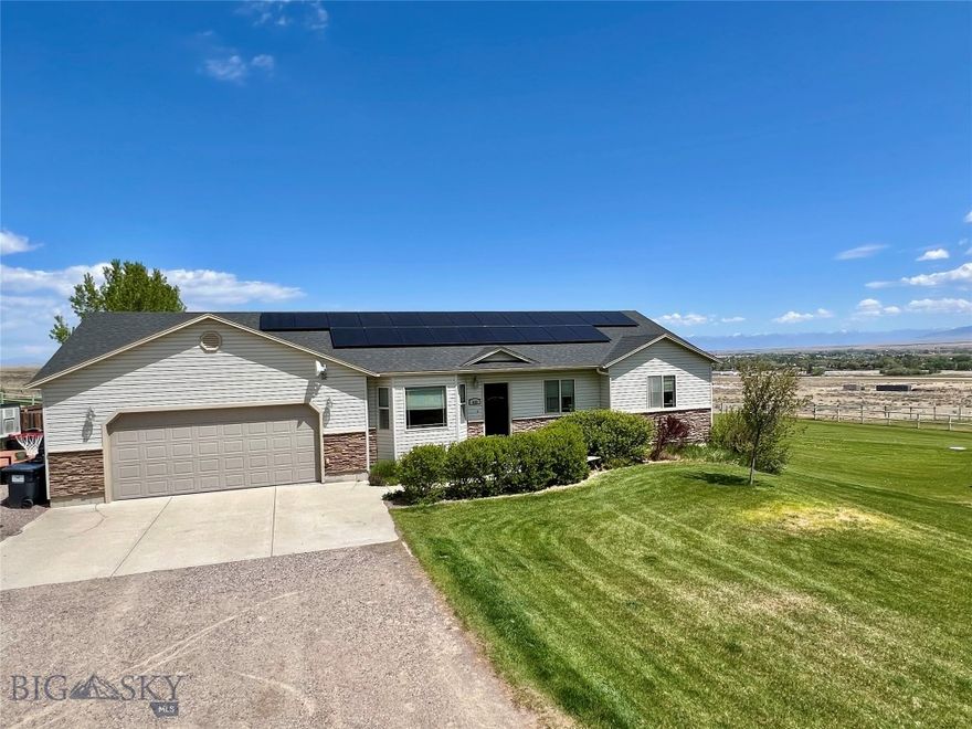 Welcome to this beautifully maintained 5 bedroom, 3 bathroom home on just over an acre in the Clark Lookout subdivision with panoramic views of the surrounding mountain ranges and Beaverhead Valley! With 2,760+/- square feet of thoughtfully designed living space, this home offers both comfort and style. Enjoy the open concept living w/vaulted ceilings in the living, dining and kitchen area…..great for entertaining and hosting family gatherings. Off the dining room you will find a French door leading out to the patio where you can enjoy your morning coffee under the pergola taking in the beautiful surrounding mountain ranges or a relaxing evening star gazing from the hot tub. The kitchen features custom alder cabinetry, stainless steel appliances, large pantry and plenty of counter space. The main floor also features the primary bedroom w/tiled soaker tub/shower, custom cabinetry and large walk-in closet, 2 guest bedrooms, full guest bathroom and laundry room. The basement offers incredible flexibility with two additional bedrooms, a full bath, a large family room with a high-efficiency wood burning stove, a bonus wood storage room with chute and a good-sized utility/storage room. This home also comes with a whole-house arsenic and water filtration system and a full solar array to help offset electric costs. The attached heated garage is extra deep allowing for 3 vehicles and comes with a 220 W plug for an EV plug-in charger. The garage also features built in work bench and shelves for extra storage. Enjoy the fully fenced and landscaped backyard offering an abundance of space for outdoor activities, family gatherings and your furry friends. This is a must see property. Call today to schedule your private showing.